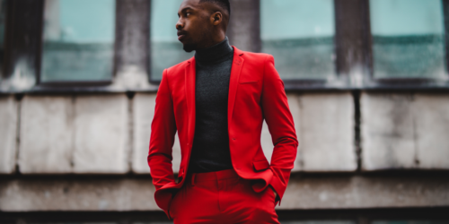 Man in sharp red suit who is dressed for success