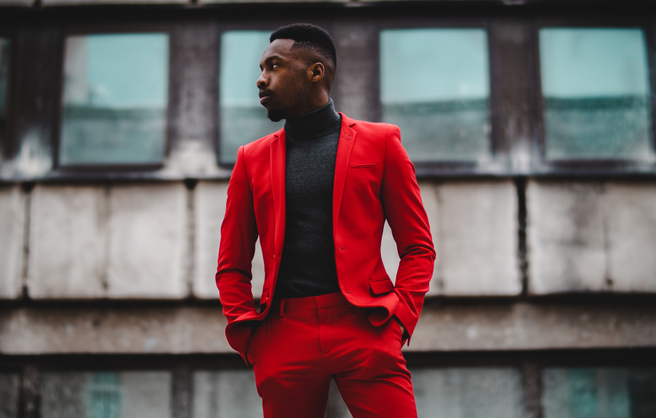 Man in sharp red suit who is dressed for success